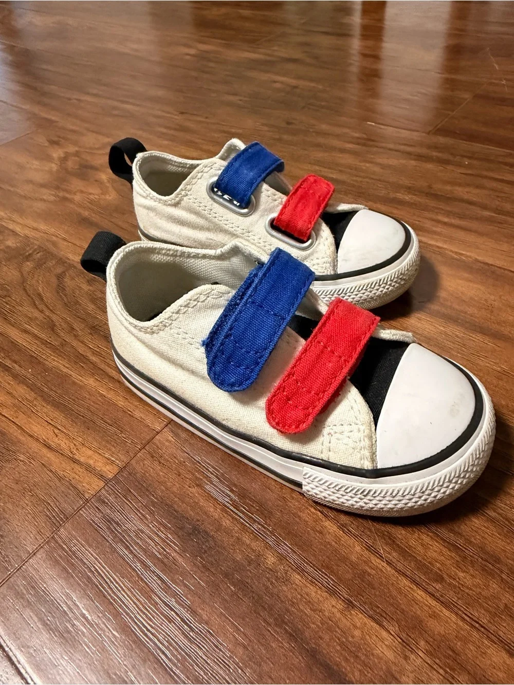 Toddler Converse White Canvas Sneakers with Black Tongue and Red & Blue Straps